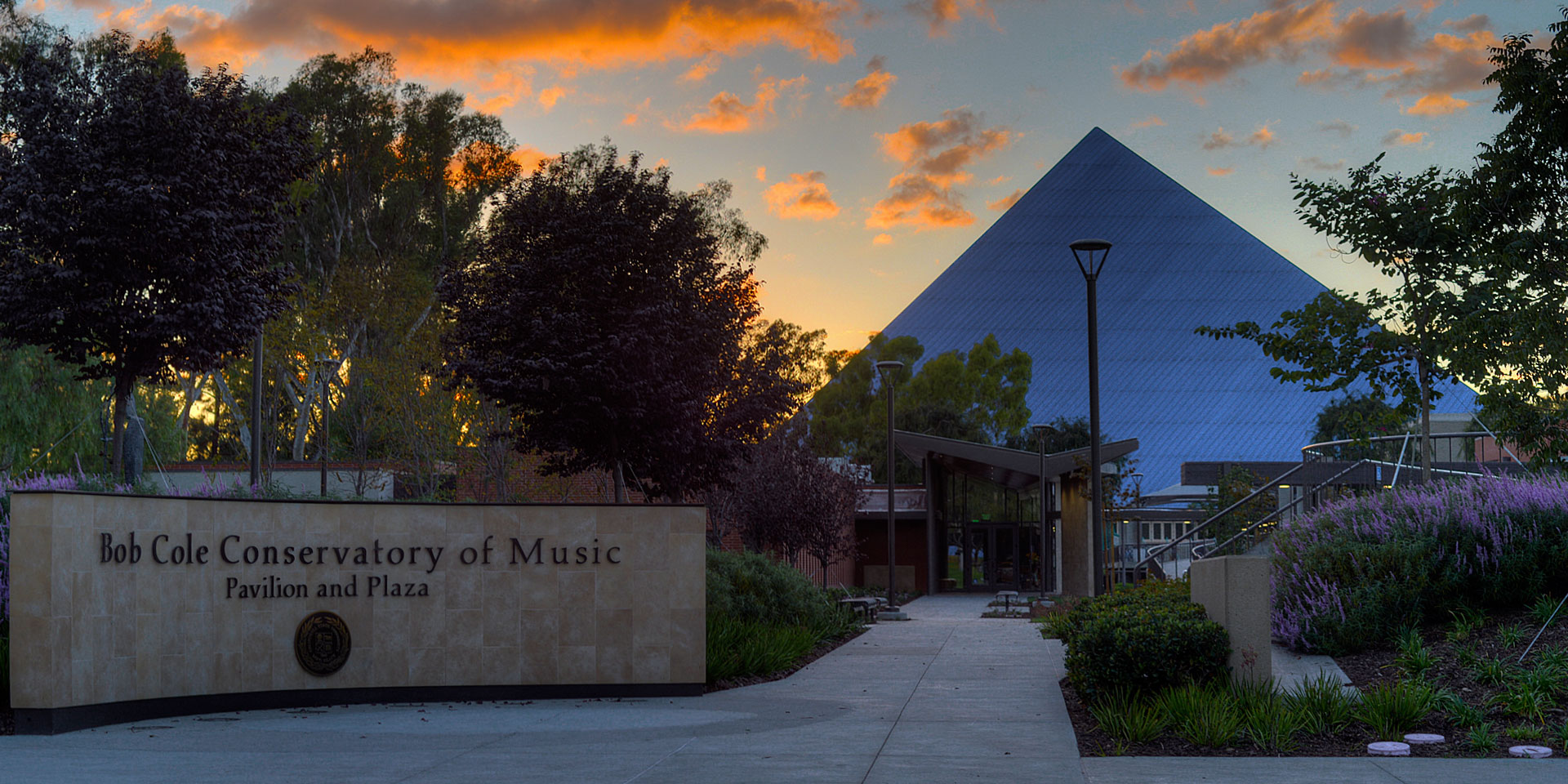 Bob Cole Conservatory Pavilion and Plaza entrance at sunset