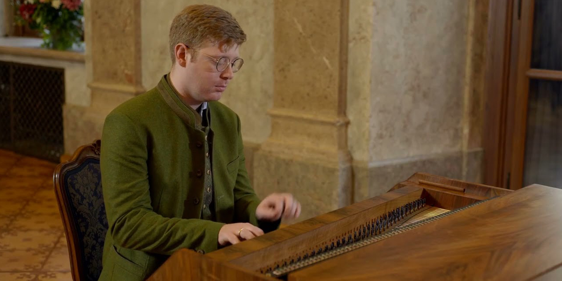 Daniel Adam Maltz sitting at a Fortepiano.