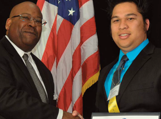 Jeremy Bonifacio receiving METRANS Transportation Center’s “Student of the Year” Award from Greg Winfree, Acting Administrator of the US Research and Innovative Technology Administration