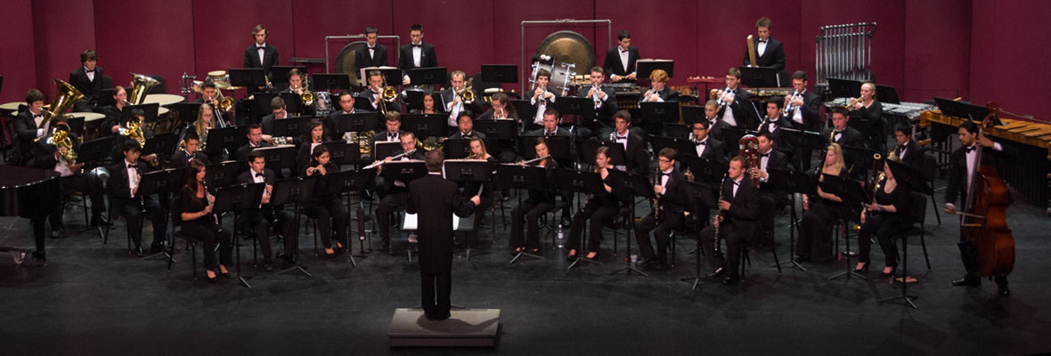The University Wind Symphony on stage at the Carpenter Center.