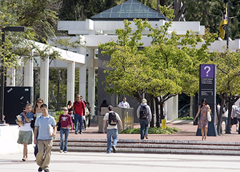 Students walking across campus by the University Student Union.