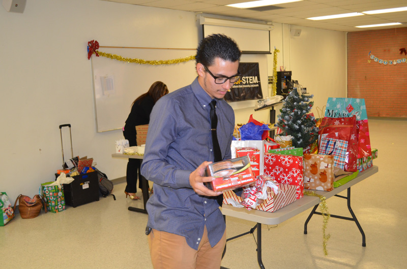 student holding gift