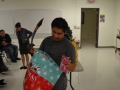 student opening a gift